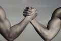 Rivalry, vs, challenge, strength comparison. Two men arm wrestling. Arms wrestling, competition. Rivalry concept - close Royalty Free Stock Photo