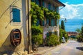 Rivaz village street view with flowery house and Geneva lake Royalty Free Stock Photo
