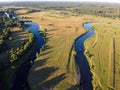 River, aerial view. Winding river and forest. Summer landscape, top view. A valley with a winding riverbed