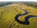 River, aerial view. Winding river and forest. Summer landscape, top view. A valley with a winding riverbed