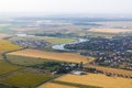 River, agriculture fields and a village