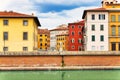 River Arno quietly passing through Pisa, Italy. Amazing view from a bridge in small town of Pisa, Italy. Landscape with Pisa old Royalty Free Stock Photo