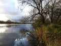 River Atmata and autumn trees, Lithuania Royalty Free Stock Photo