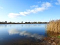 River Atmata and nice cloudy sky, Lithuania Royalty Free Stock Photo