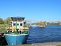 River Atmata, ships and bridge, Lithuania Royalty Free Stock Photo