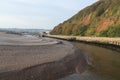 The river Axe near Seaton in Devon curves round a sandbank just before entering the sea Royalty Free Stock Photo