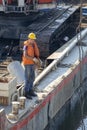 River barge with worker posing