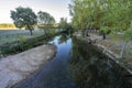 river beach of the alviela river with plenty of water. Royalty Free Stock Photo