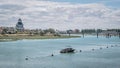 River with boat docked alongside Royalty Free Stock Photo