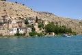 River boat in front of Sunken village at Firat River