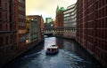 River, boat and modern building with river. Modern Venice. The canals of Hamburg on the Elbe River. Beautiful river Royalty Free Stock Photo