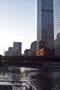River with a bridge above it surrounded by modern buildings under sunlight in Chicago Royalty Free Stock Photo