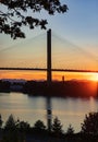 River and bridge at beautiful summer sunset. A view of the Alex Fraser Bridge from North Delta BC Royalty Free Stock Photo