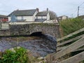 River Caen Braunton is an English village, civil parish, ecclesiastical parish and former manor in Devon