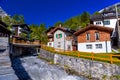 River and chalet in swiss village in Alps, Leukerbad, Leuk, Visp Royalty Free Stock Photo