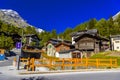 River and chalet in swiss village in Alps, Leukerbad, Leuk, Visp, Wallis, Valais Switzerland Royalty Free Stock Photo