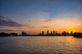 River city view landscape at twilight sunset. Boat on river with tranquil water. Hochiminh city Saigon vietnam cityscape building Royalty Free Stock Photo