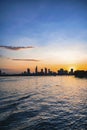 River city view landscape at twilight sunset. Boat on river with tranquil water. Hochiminh city Saigon vietnam cityscape building Royalty Free Stock Photo