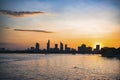 River city view landscape at twilight sunset. Boat on river with tranquil water. Hochiminh city Saigon vietnam cityscape building Royalty Free Stock Photo