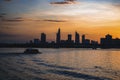 River city view landscape at twilight sunset. Boat on river with tranquil water. Hochiminh city Saigon vietnam cityscape building Royalty Free Stock Photo