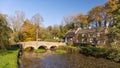 The River Coln and Bridge, Bibury, Gloucestershire, England.