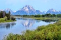 A river in Colorado reflects snow capped mountains. Royalty Free Stock Photo