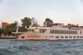 River Countess luxury passenger ship in Venice lagoon, Italy.