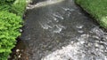 River course with eddies and rapids through stones