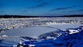 River covered with piles of ice smithereens Royalty Free Stock Photo