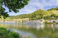 Ship on the Mosel river at Bernkastel-Kues with ruin Landshut