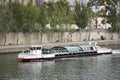 River Cruises sailing bring travelers passengers tour Paris city at riverside of Seine river