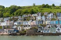 Bayard`s Cove Fort Dartmouth Devon with houses on the hillside in historic English town with the River Dart