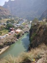 A river divides two nation in hills area