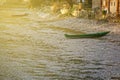 River drought, green boat without water due global warming