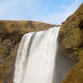 River fall in skogafoss waterfall with blue sky Royalty Free Stock Photo