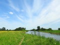 River, field and beautiful cloudy sky, Lithuania