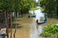 River in floating water season with paddle boats in Mekong delta, southern Vietnam