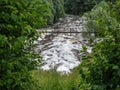 River flooding at a dam after rain in Central Russia.