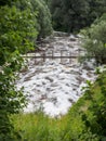 River flooding at a dam after rain in Central Russia.