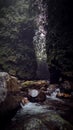 River flow from a waterfall on Mount Bunder, Indonesia Royalty Free Stock Photo