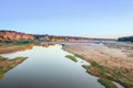 River flowing through Kruger National Park at sunset with a herd of African bush elephant (Loxodonta africana) Royalty Free Stock Photo