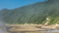 The river flows along a rocky bed in the Valley of Geysers. Royalty Free Stock Photo