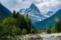 The river flows in a deep gorge, the mountains of Caucasus