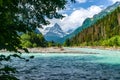 The river flows in a deep gorge, the mountains of Caucasus