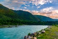 The river flows in a deep gorge, the mountains of Caucasus