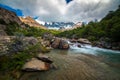 The river flows through the stone rapids in the mountains. Shevelev. Royalty Free Stock Photo