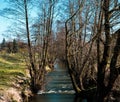 The river flows between trees, meadow, spring, nature, spring river. Royalty Free Stock Photo