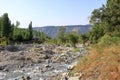 the river at the foot of the waterfall near Arslanbob, Kyrgyzstan, Central Asia