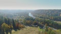 River and forest in Autumn Sigulda city nature, Gauya, 4K drone flight, bridge car drive from above