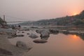 At the river Ganges in India at sunset